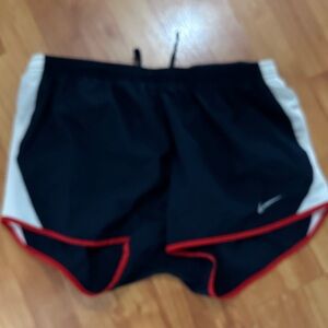 Nike Black Shorts with White Side Panels and Red Trim